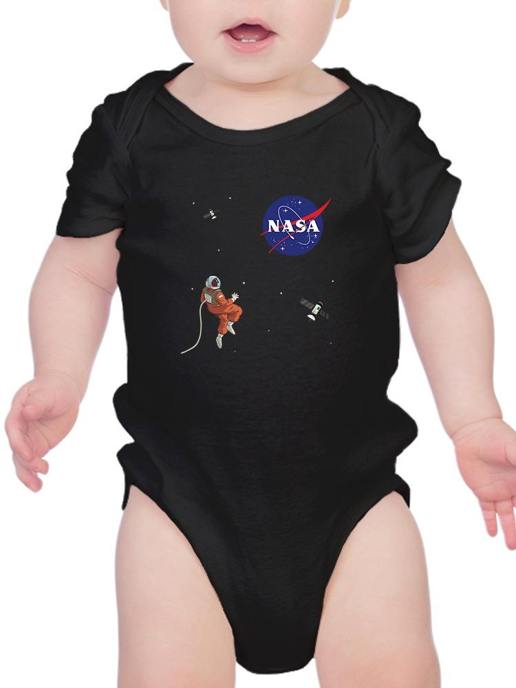 a baby in a black bodysuit