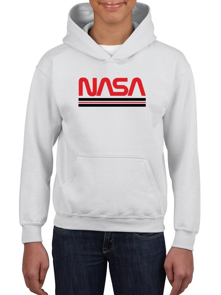 a person wearing a white sweatshirt with a red logo