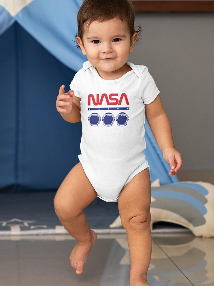 a baby standing on one foot