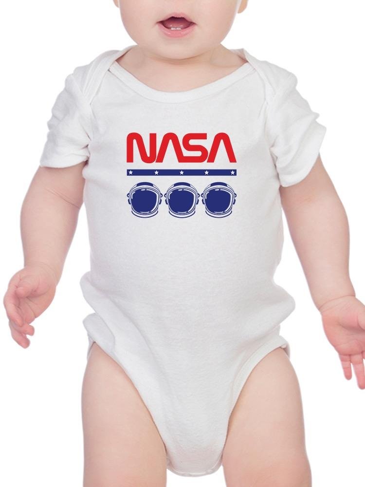 a baby wearing a white bodysuit