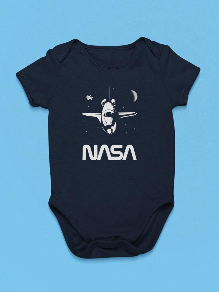 a baby bodysuit with a picture of a plane and moon