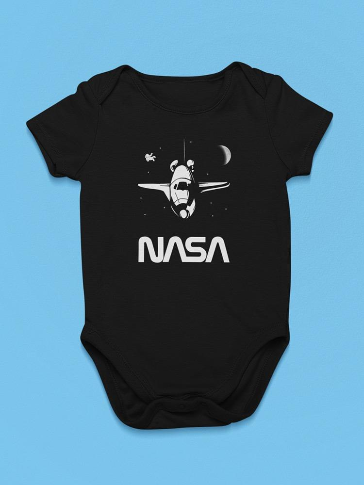 a black baby bodysuit with a picture of a plane and moon