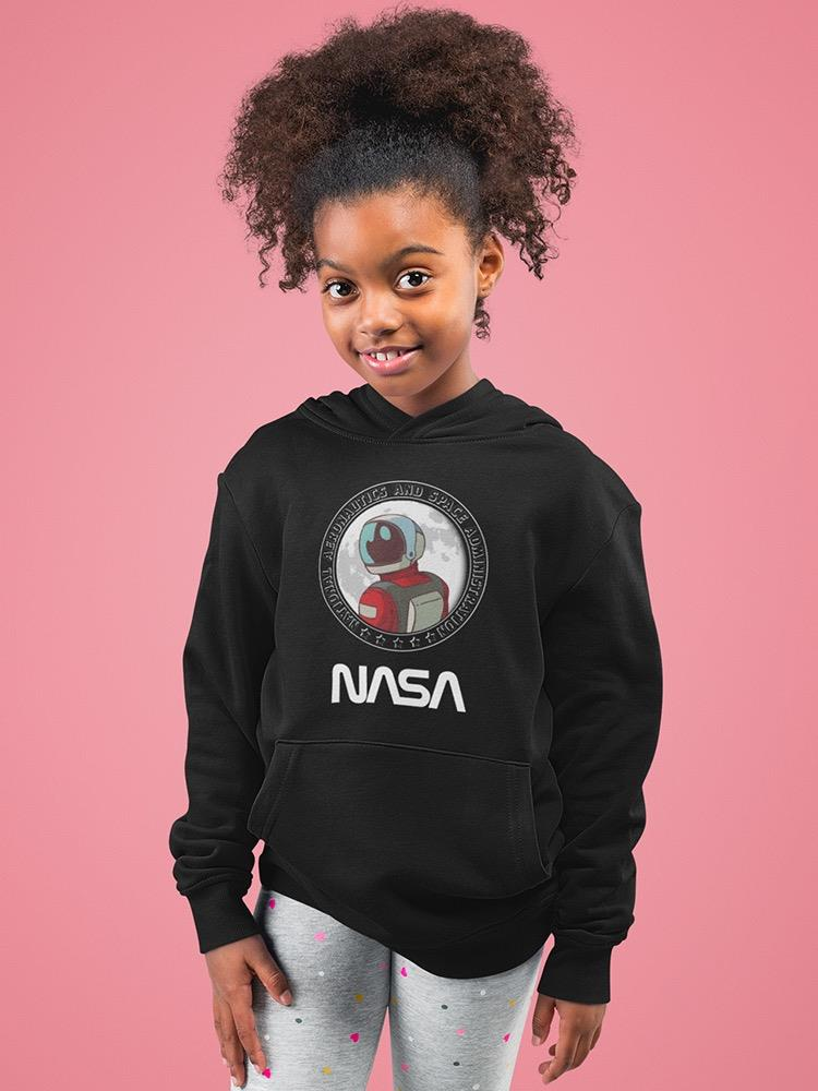 a girl wearing a black sweatshirt