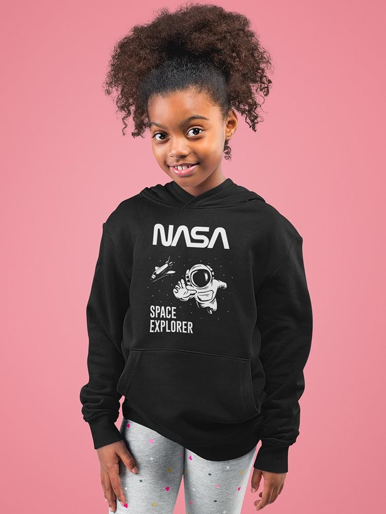 a girl wearing a black sweatshirt