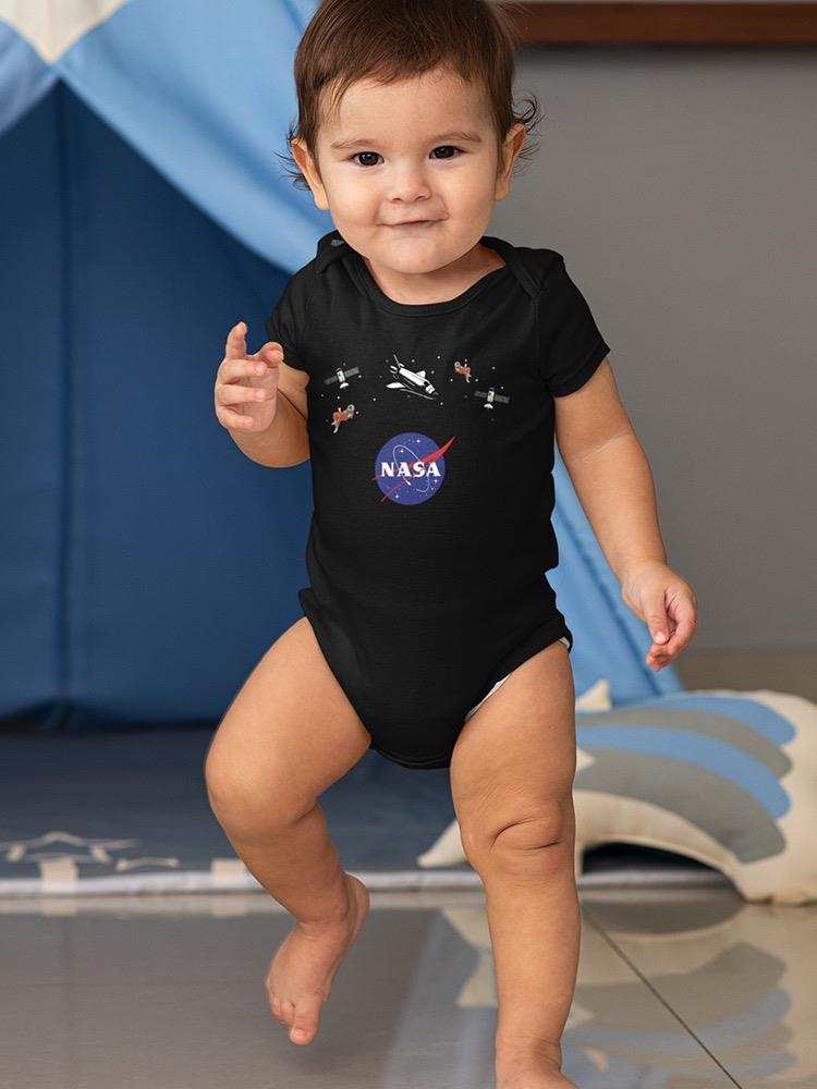 a baby standing in a room