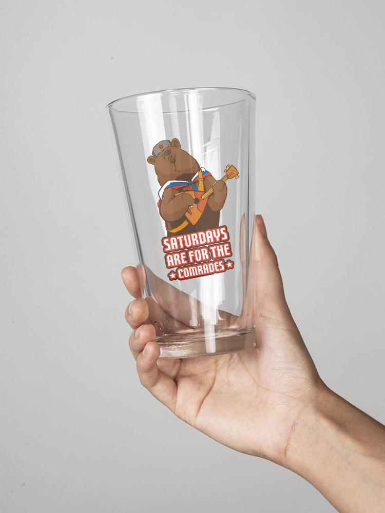 a hand holding a glass