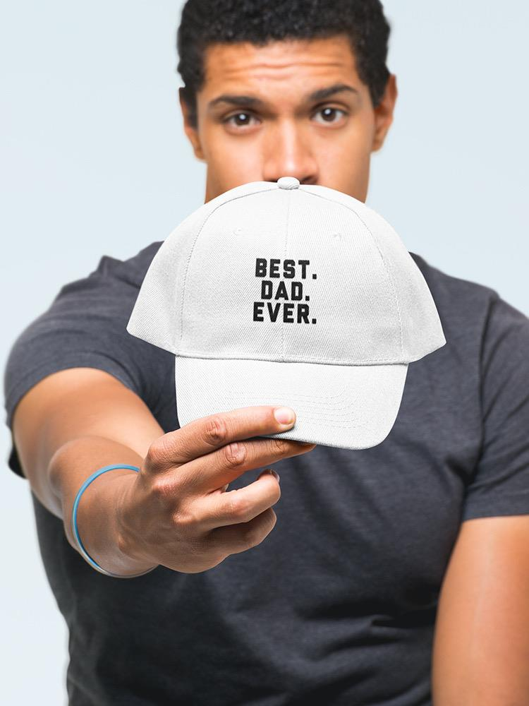 a man holding a hat