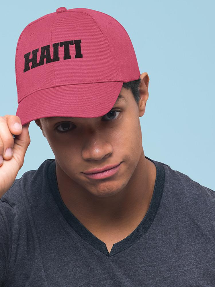 a man wearing a red hat