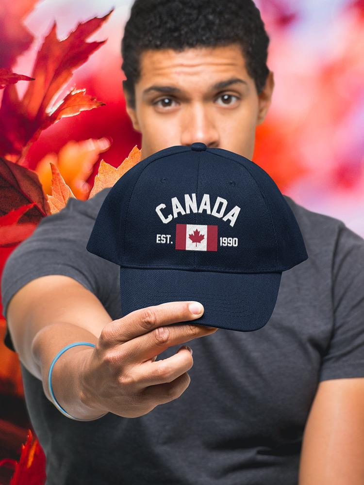a man holding a hat