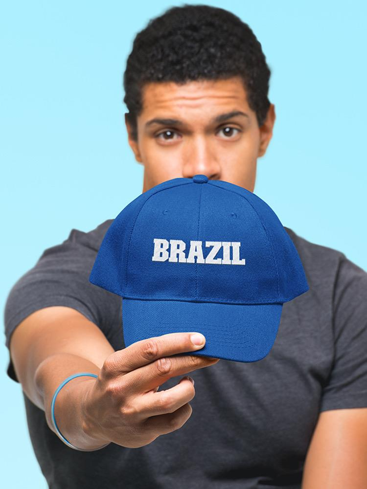 a man holding a blue hat