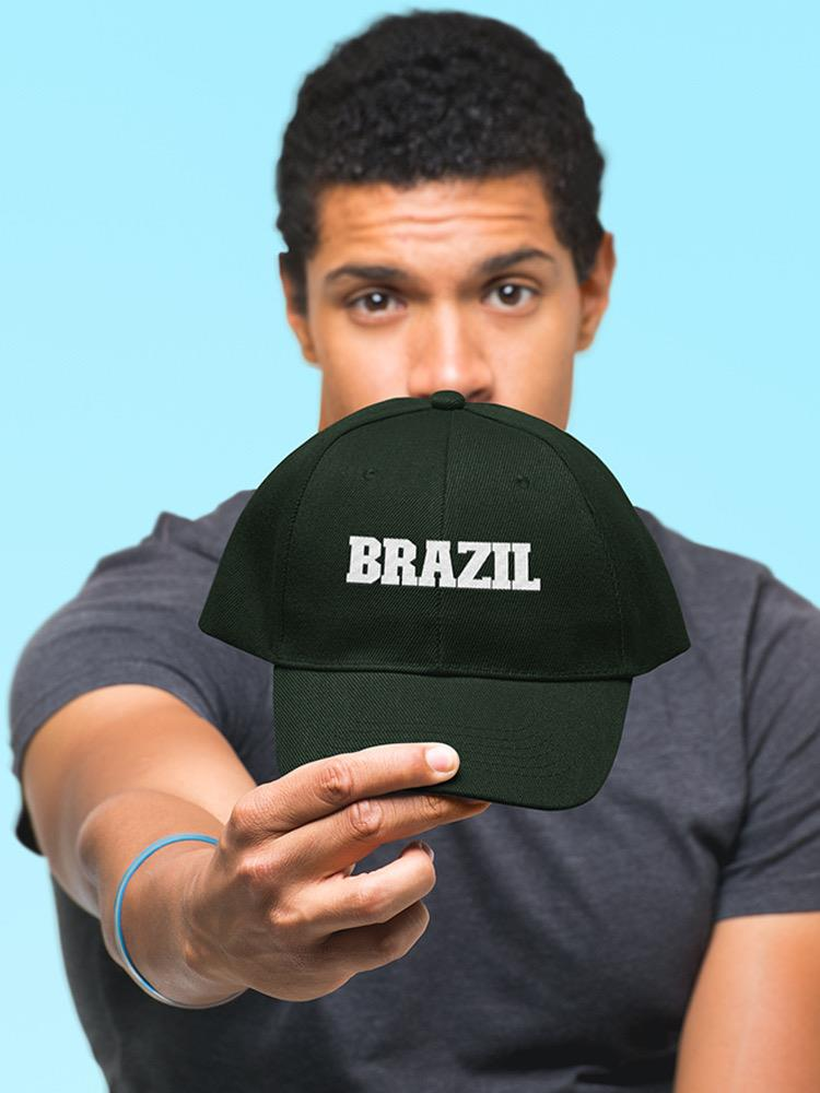 a man holding a hat