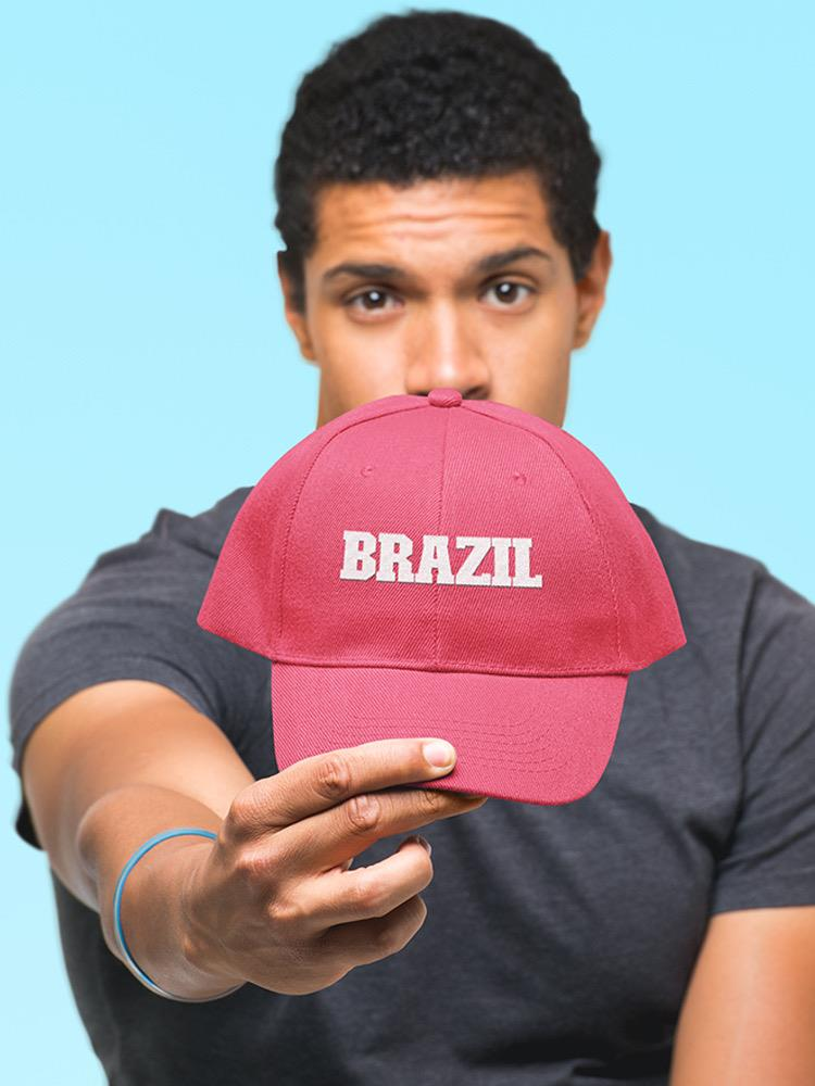 a man holding a hat