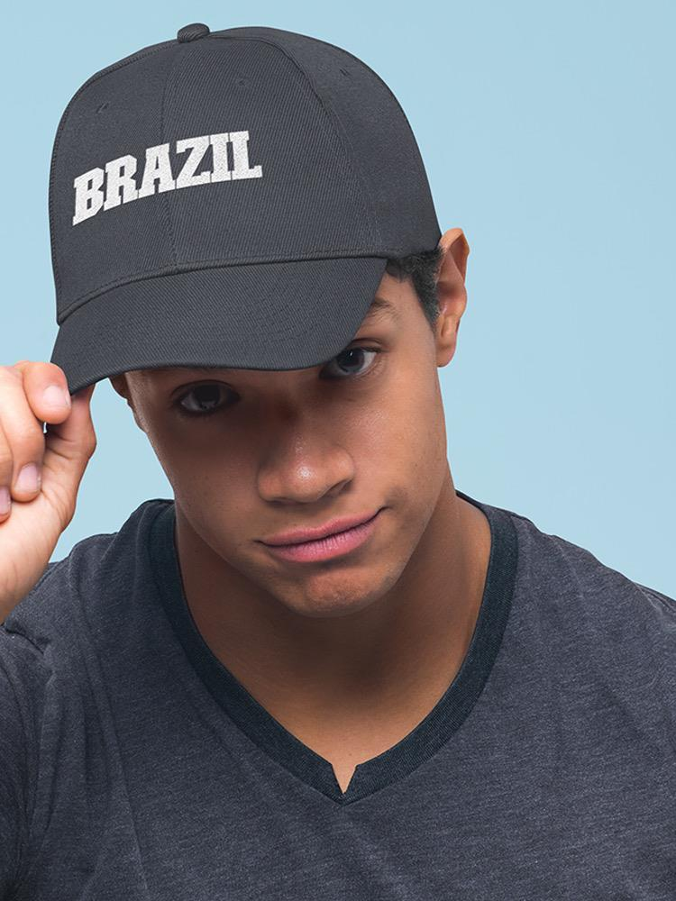 a man wearing a black hat