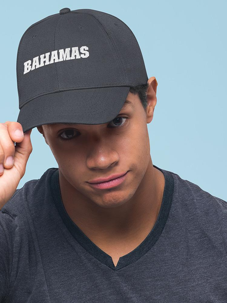 a man wearing a black hat
