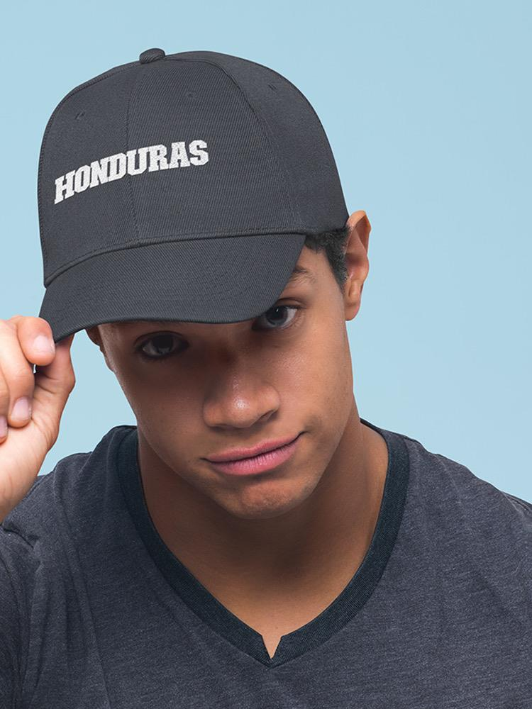 a man wearing a black hat