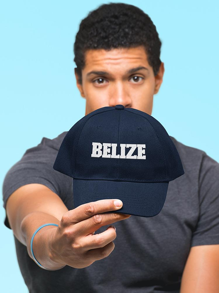 a man holding a hat