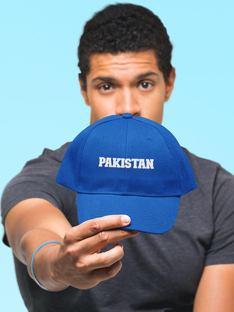 a man holding a blue hat