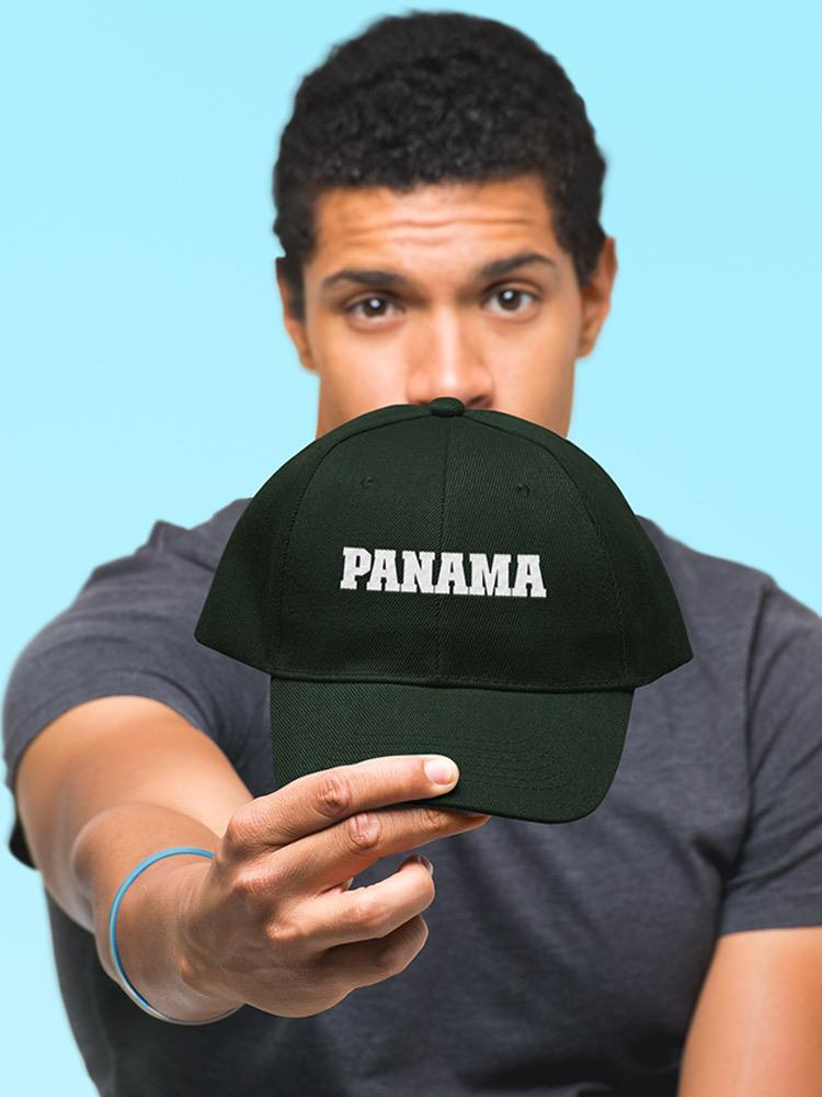 a man holding a hat