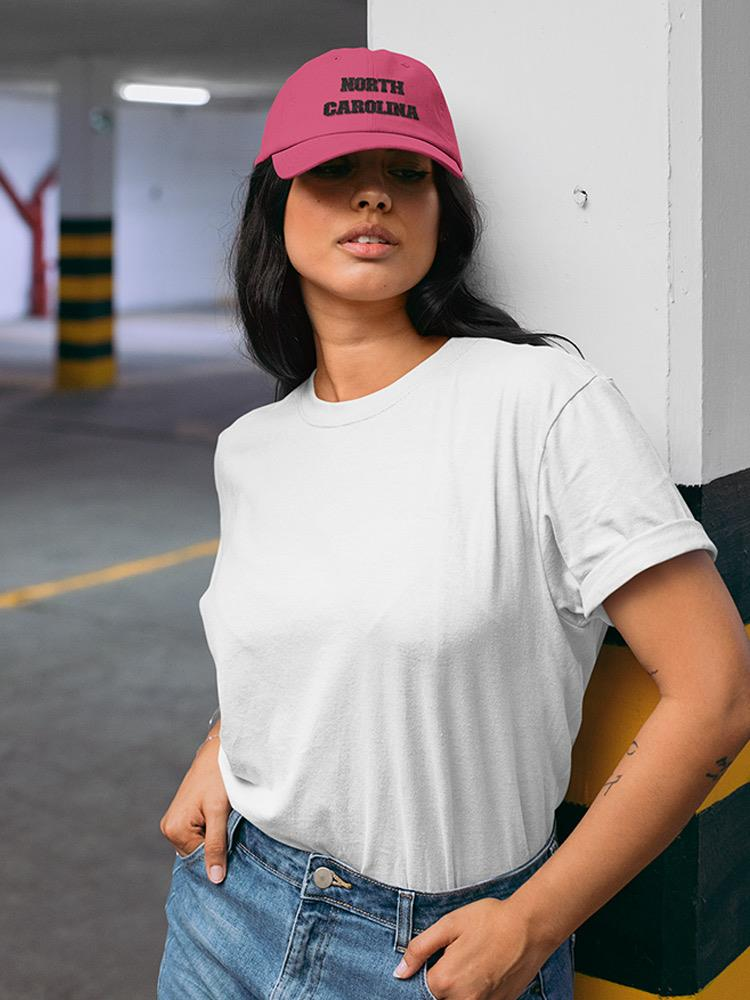 a woman wearing a pink hat