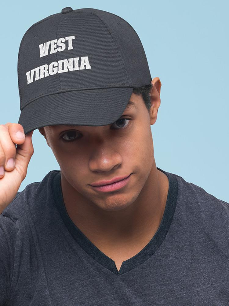 a man wearing a black hat