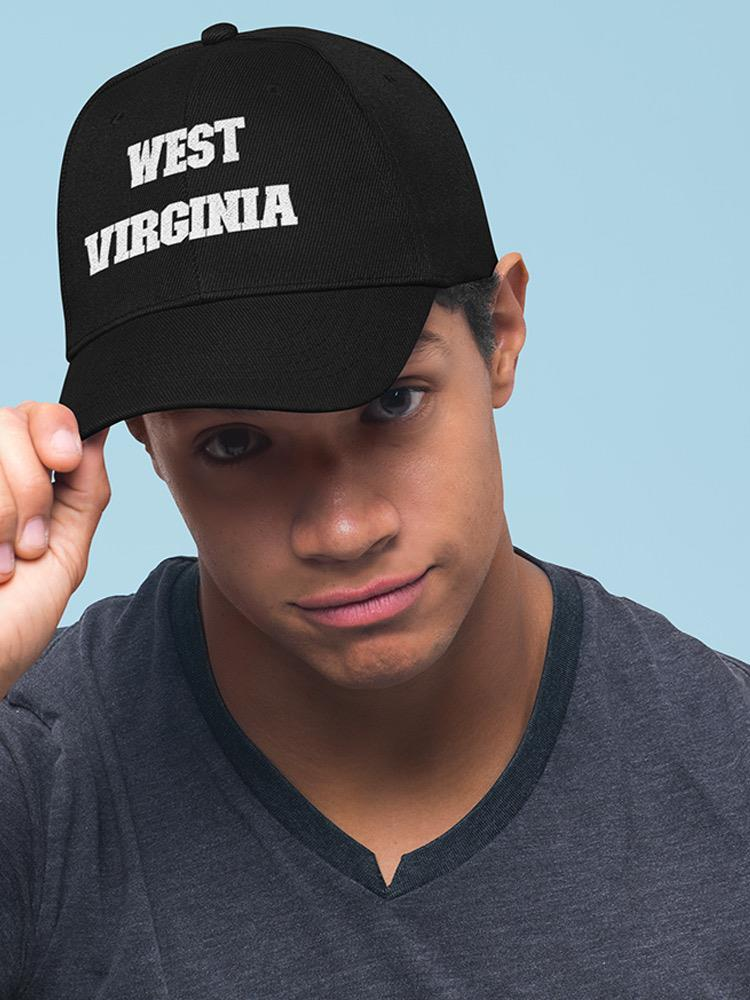 a man wearing a black hat