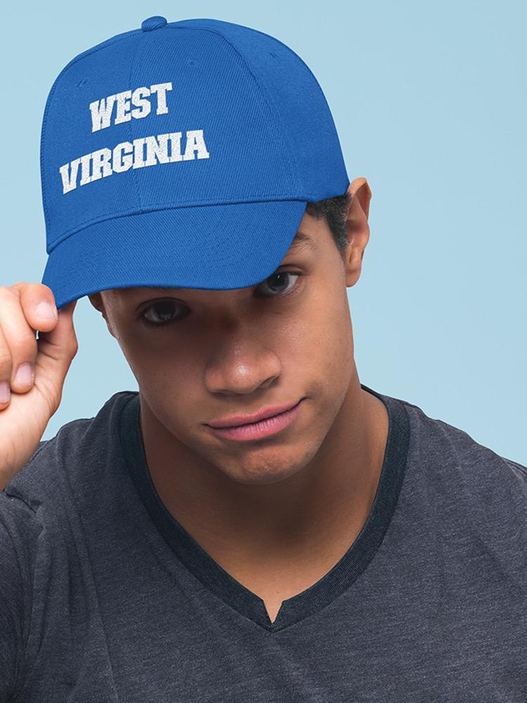 a man wearing a blue hat