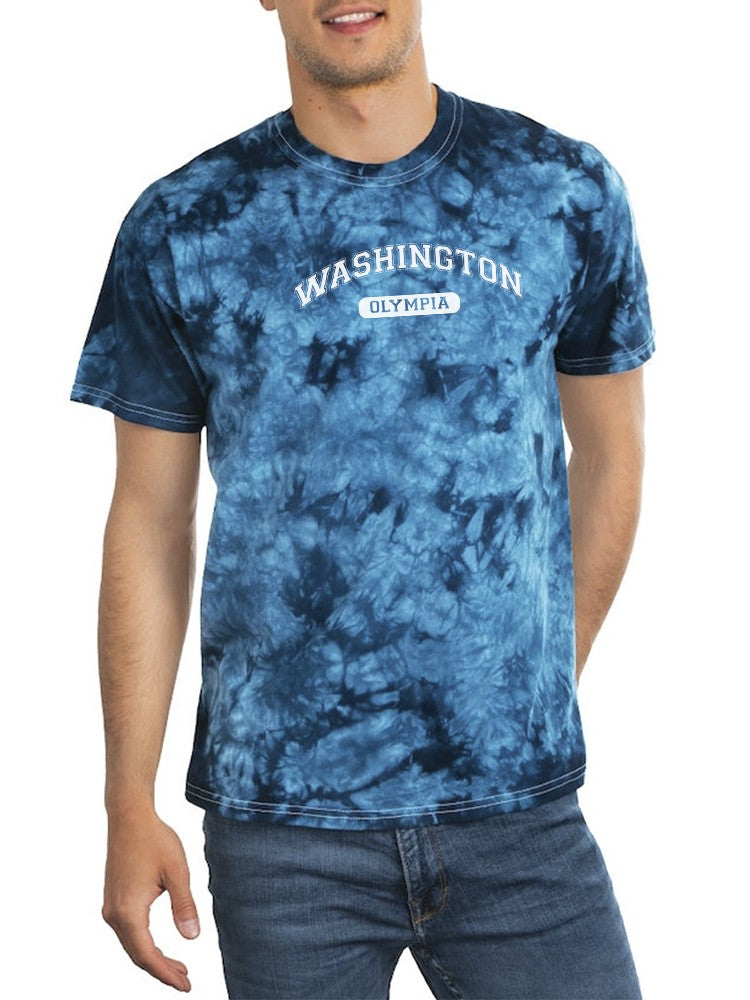 a man wearing a tie dye shirt