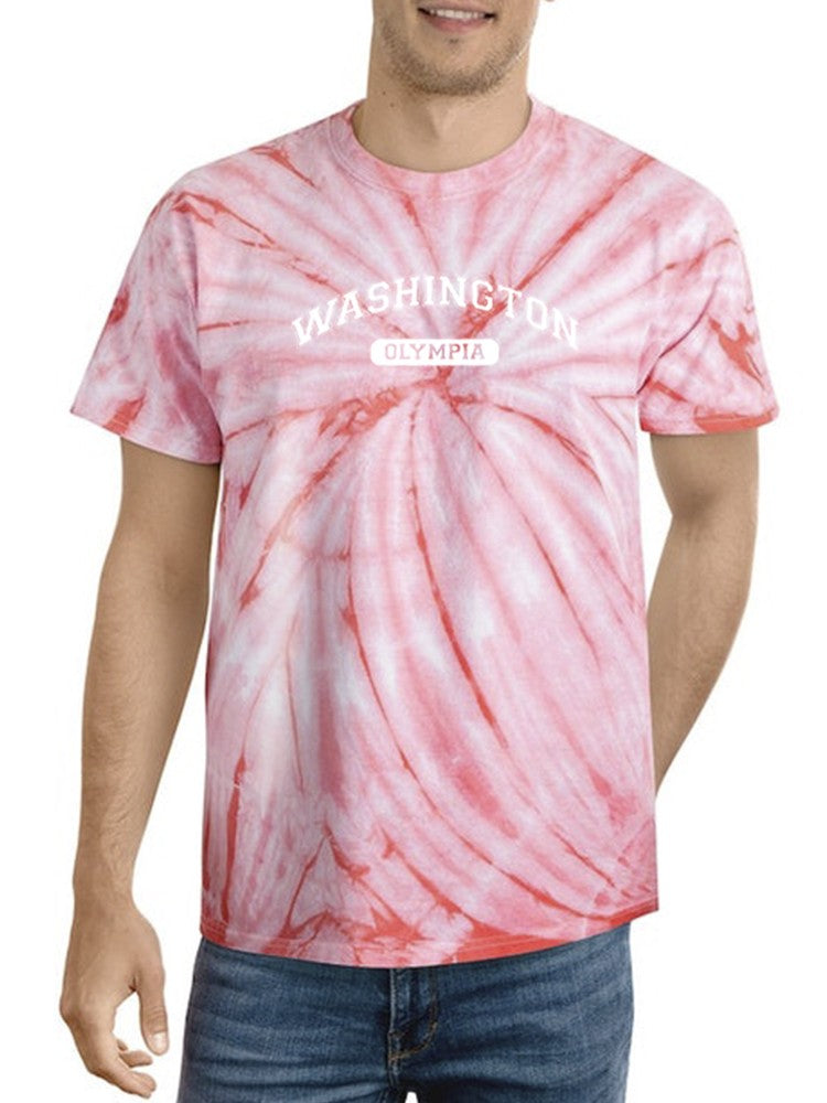 a man wearing a tie dye shirt