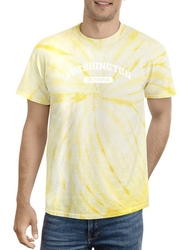 a man wearing a tie dye shirt