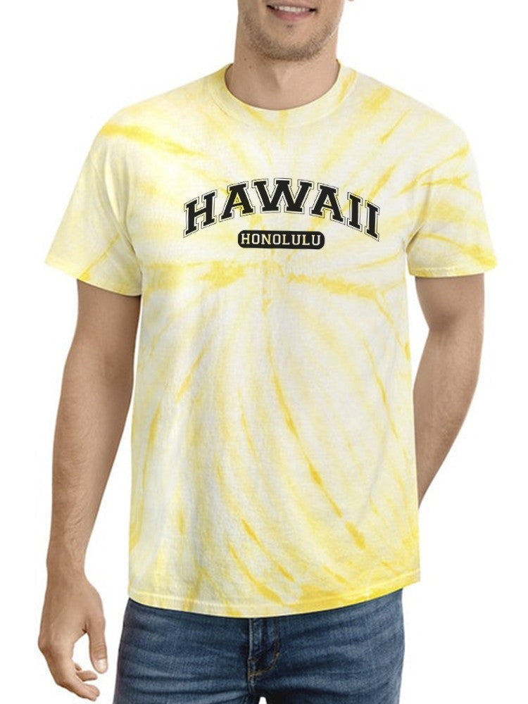 a man wearing a tie dye shirt