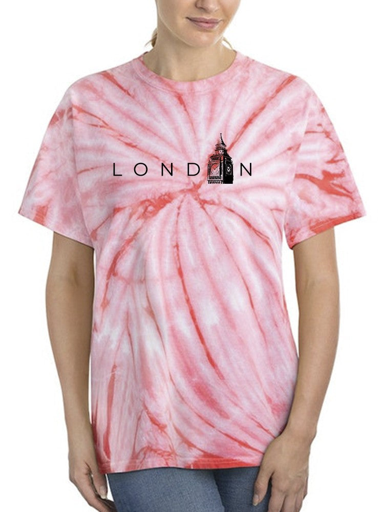 a man wearing a tie dye shirt