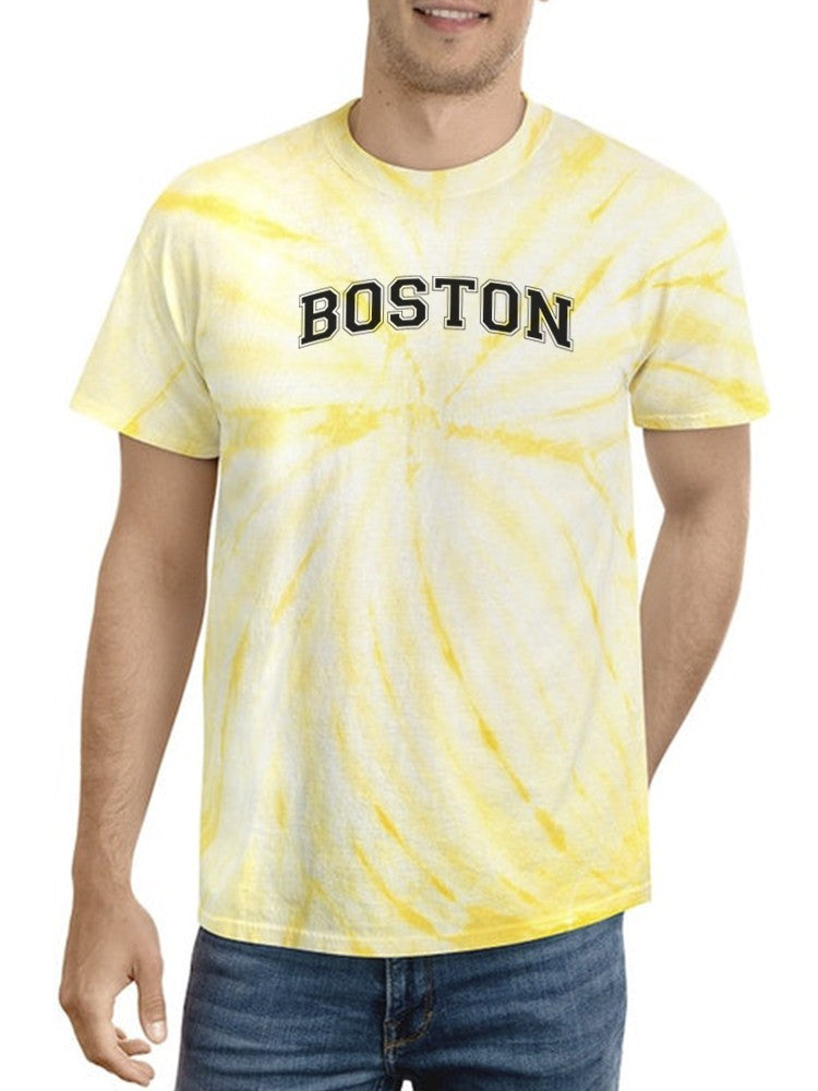 a man wearing a tie dye shirt
