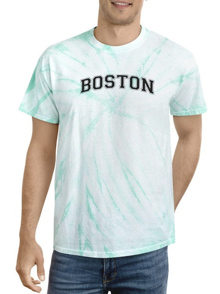 a man wearing a tie dye shirt