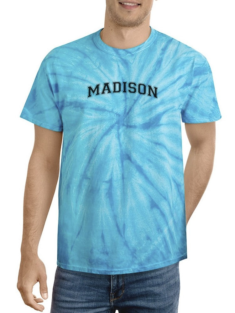 a man wearing a tie dye shirt