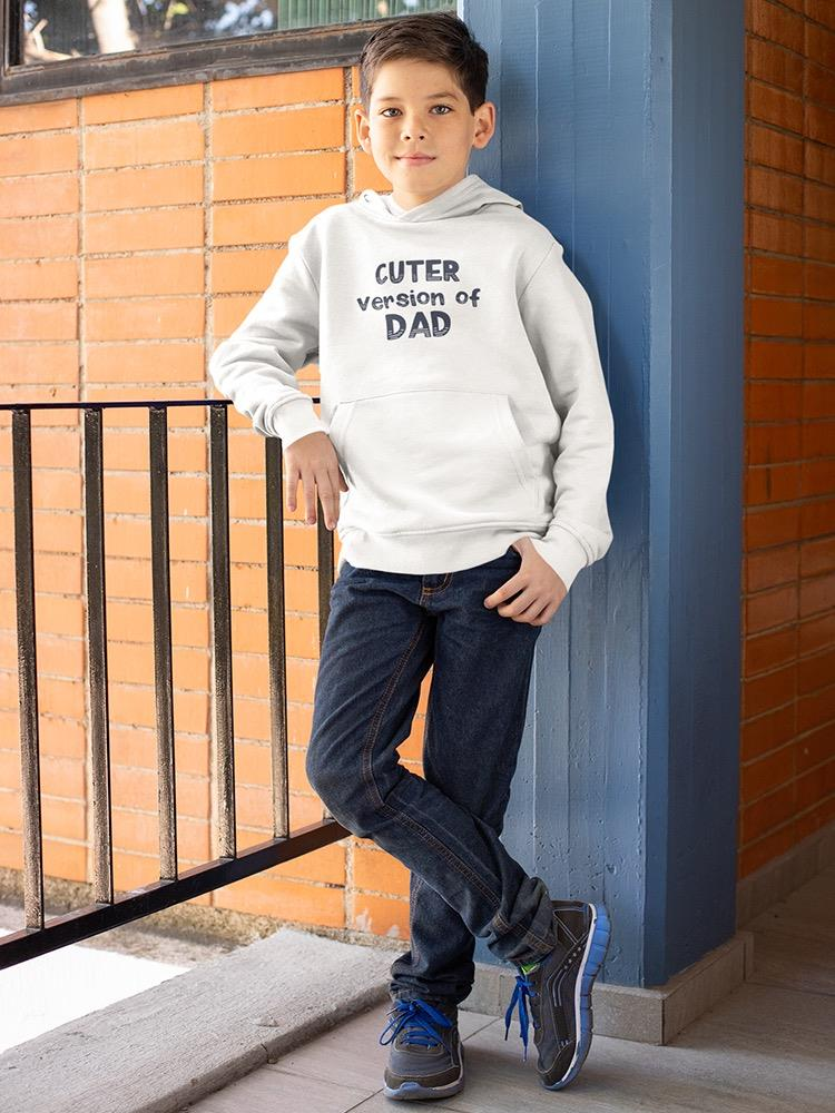 a boy leaning against a railing