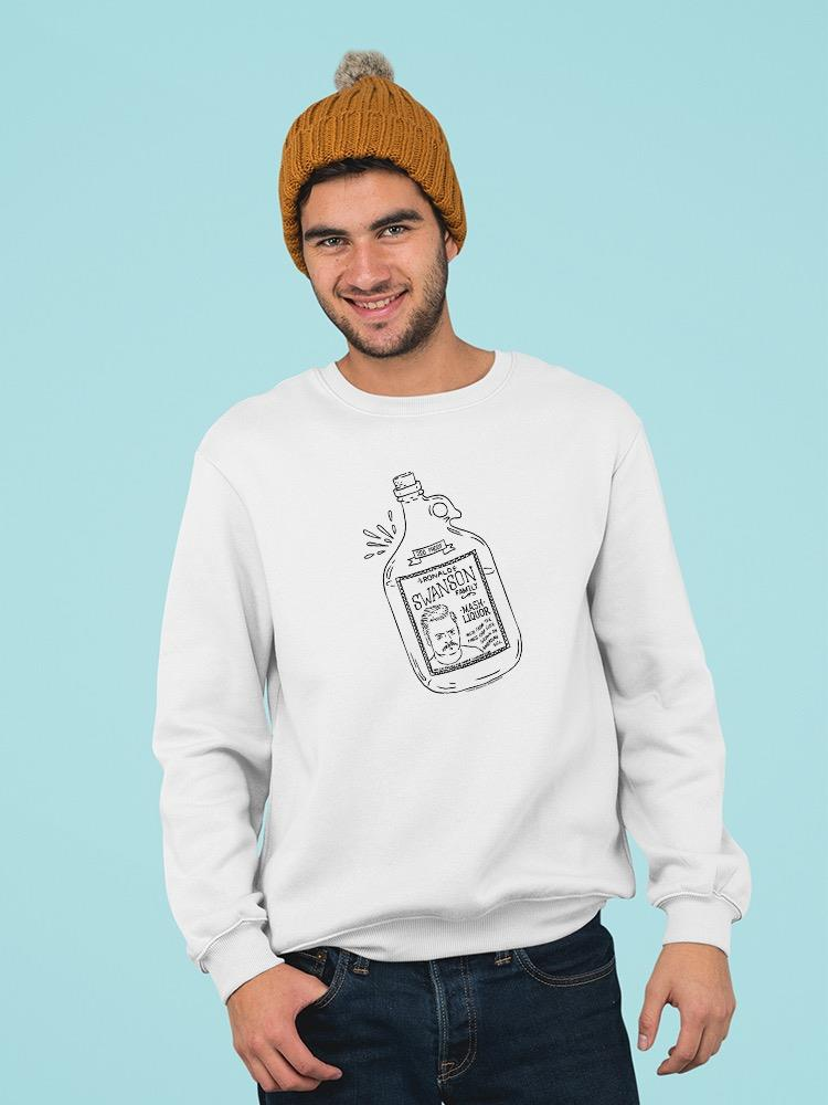 a man wearing a hat and a white shirt with a bottle on it