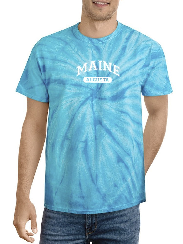 a man wearing a tie dye shirt