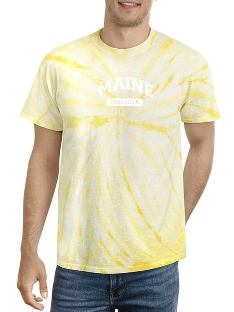 a man wearing a tie dye shirt