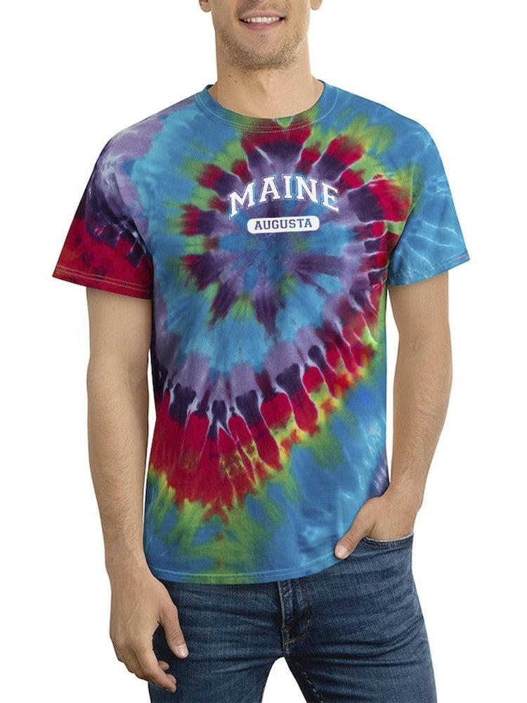a man wearing a tie dye shirt