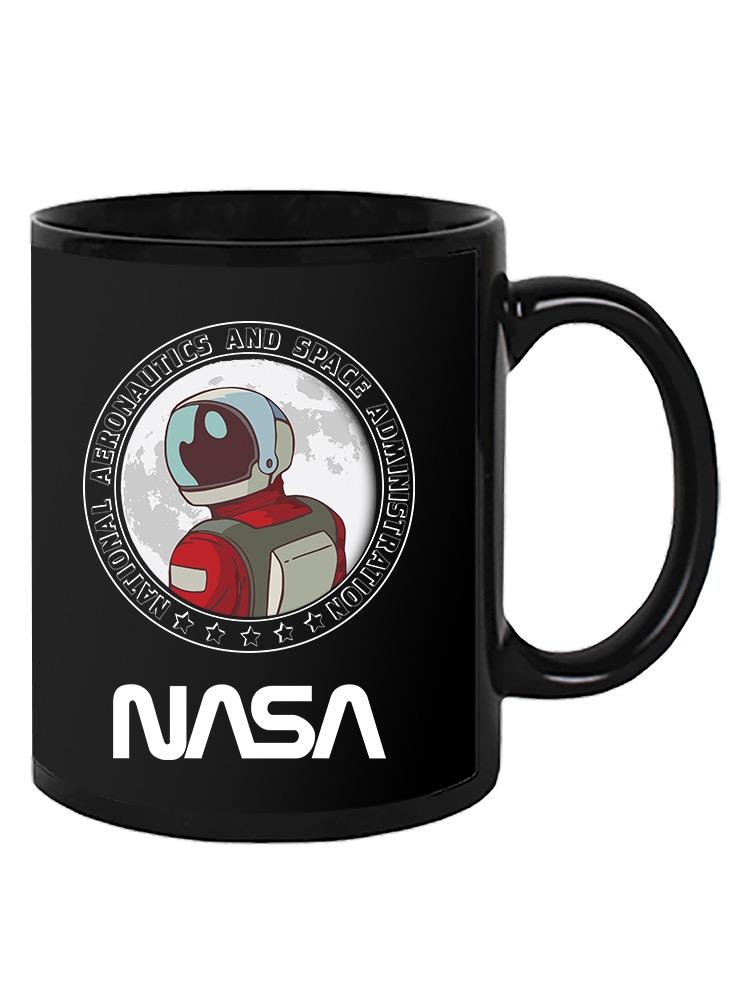 a black mug with a cartoon astronaut in the middle