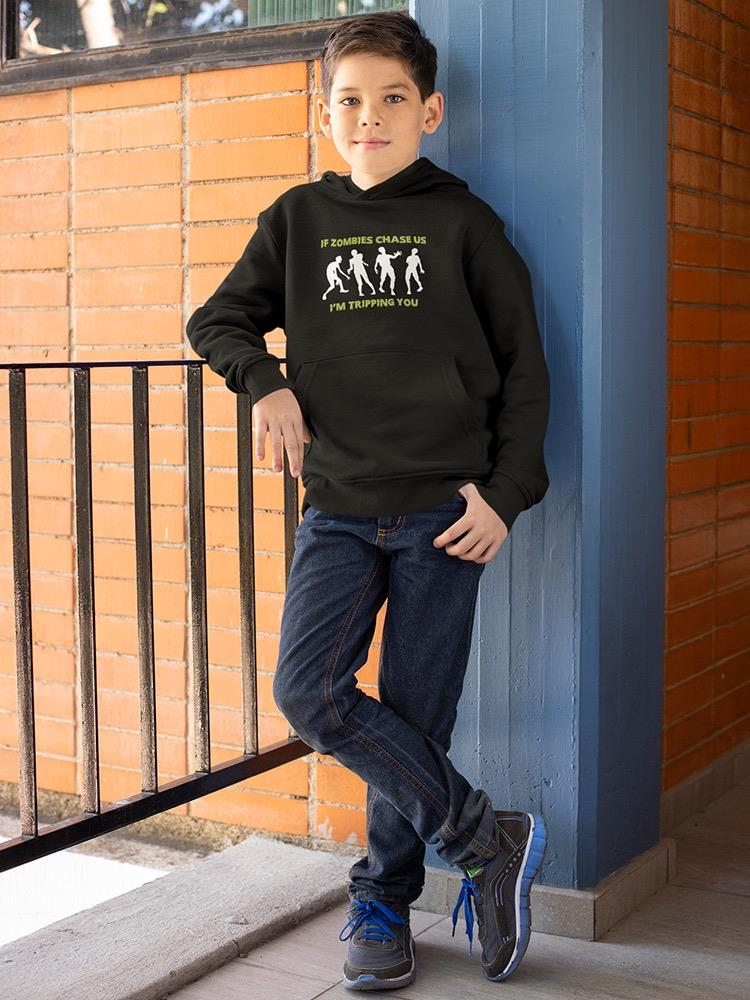a boy leaning against a railing