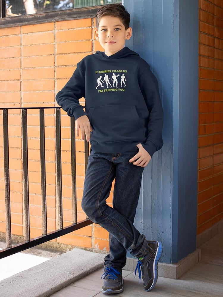 a boy leaning against a railing
