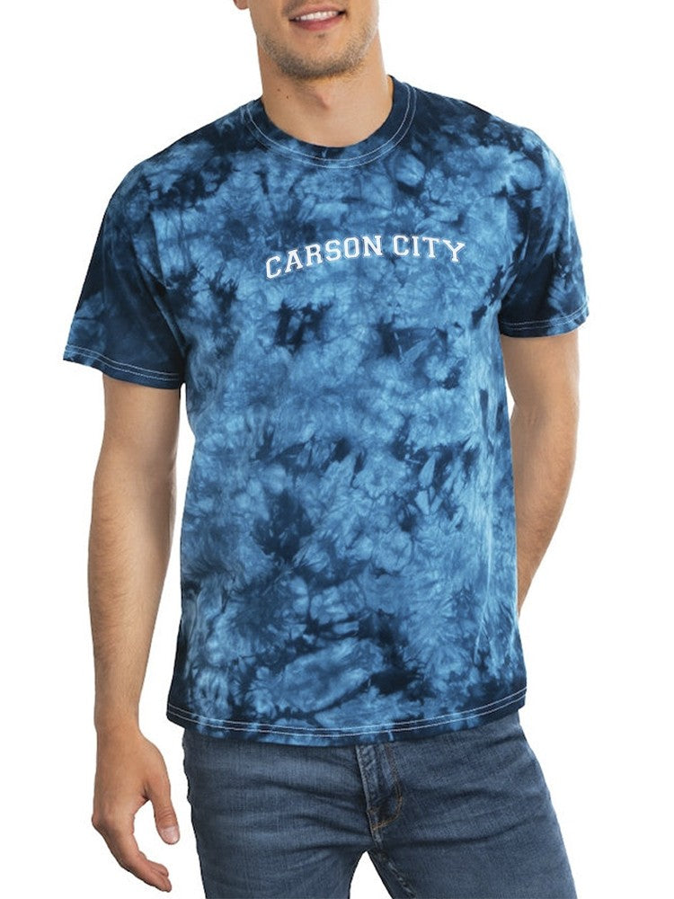 a man wearing a tie dye shirt