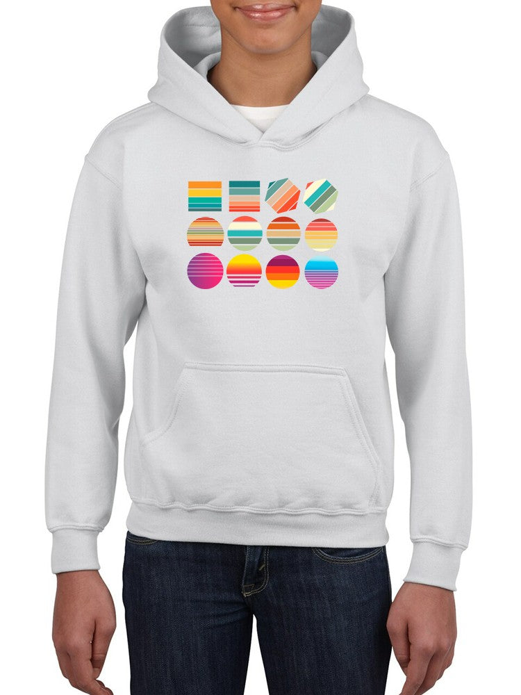 a person wearing a white hoodie with colorful circles