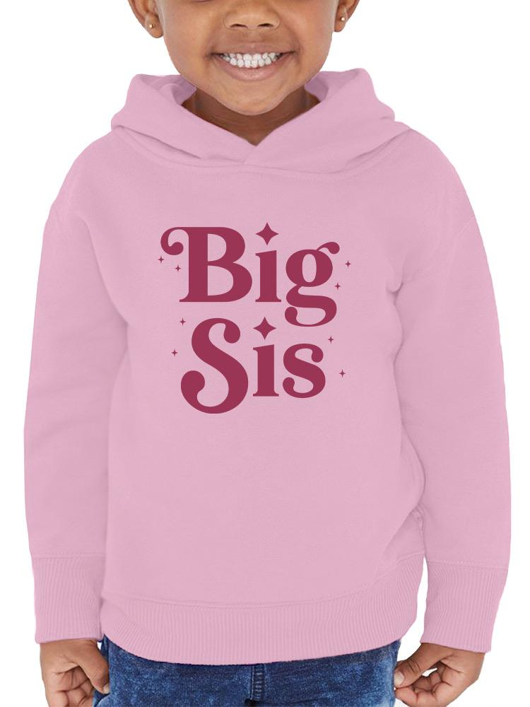 a person wearing a pink sweatshirt