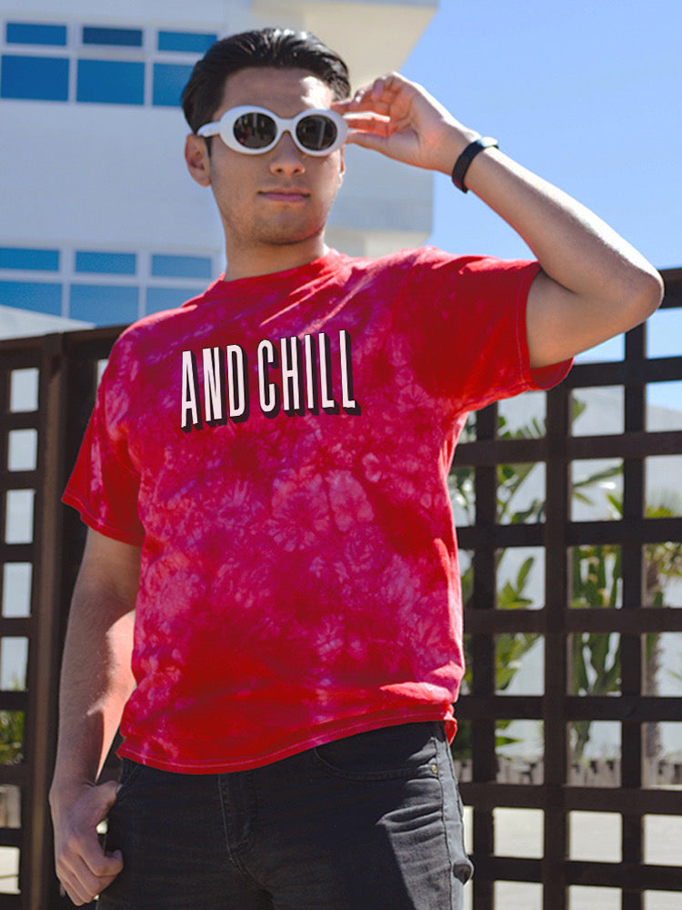 a man wearing sunglasses and a red shirt