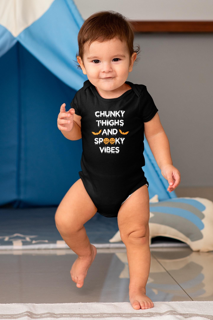 a baby in a black shirt