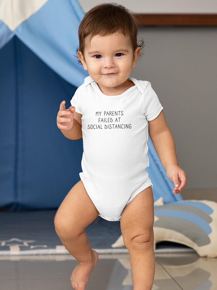 a baby standing on a blanket