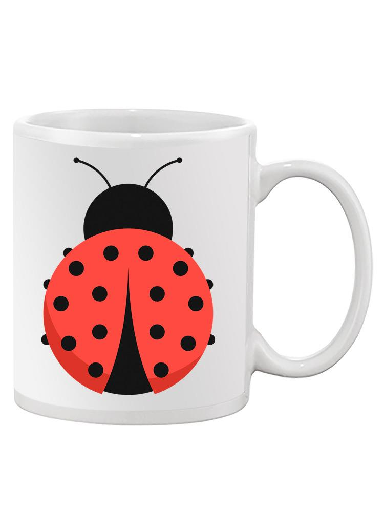 a white mug with a ladybug on it