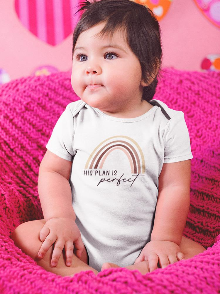 a baby sitting on a pink blanket